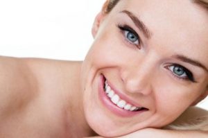 stock image of woman smiling for blog about cosmetic dentistry services in Charlotte, NC