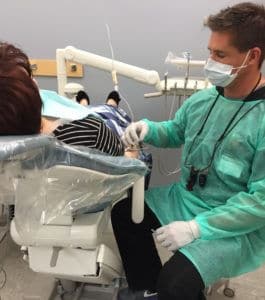 patient receiving professional teeth whitening service from a cosmetic dentist in Charlotte, NC