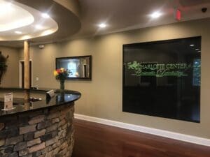 Photo of the reception desk at Charlotte Center for cosmetic dentistry in Charlotte, NC.